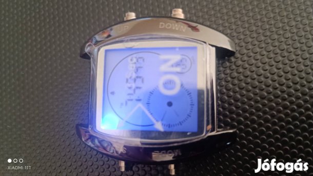 Digitális lcd karóra, fóliás, szíj nélkül.