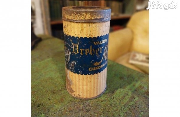 Dreheres cukorkás fémdoboz, henger alakú régi doboz dekorációnak