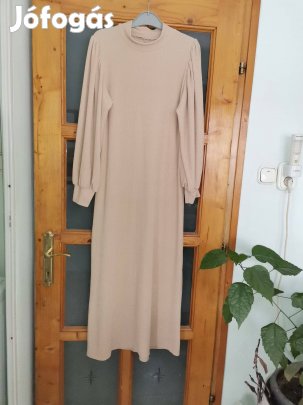 Eladásra kínálok egy bézs színű női ruhát