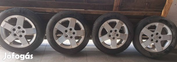 Eladó Opel 185/60 R15 Nyári gumi szett alufelnire szerelve.