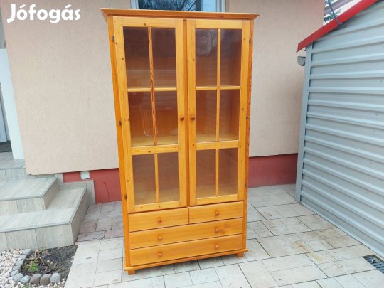 Eladó egy Magas , 4 fiókos , polcos vitrines szekrény. Bútor jó állap