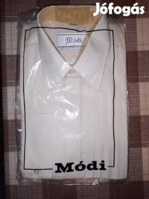 Eladó egy vadonat új krém színű hosszú ujjú ing!