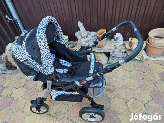 Eladó jó állapotban lévő babakocsi az összes felszerelésével esővédőve