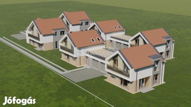 Eladó újépítésű garázskapcsolatos ikerház Gödöllő Alvégben