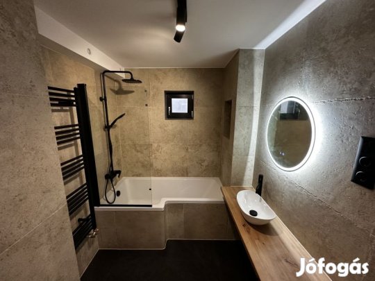 Exkluzív lakás kertkapcsolattal és garázzsal eladó