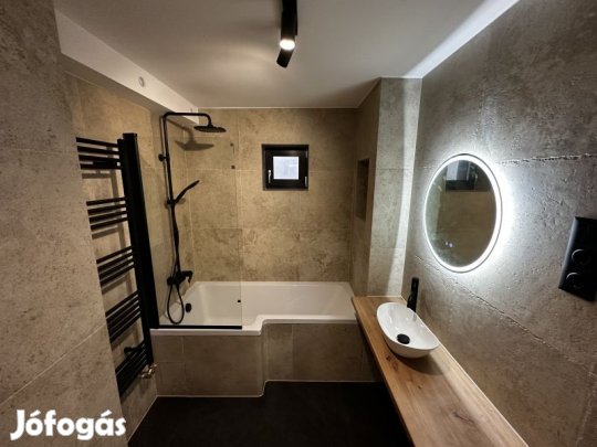 Exkluzív lakás kertkapcsolattal és garázzsal eladó