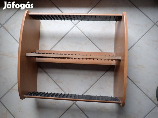 Fali polc, video kazetta tartó