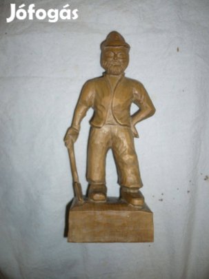 Faragott fa favágó fa szobor