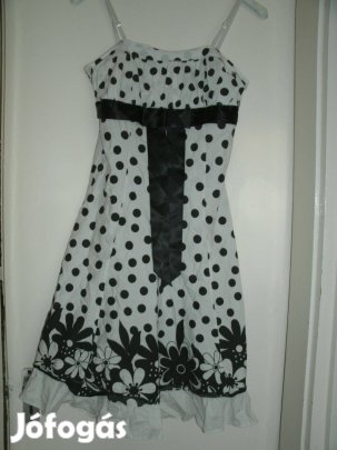 Fehér alapon fekete pöttyös ruha, hátán gumis, pántja állítható