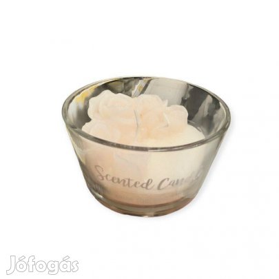 Fehér illatgyertya rózsával üvegedényben