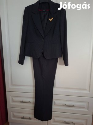 Fekete bézs diszkrét csíkos bőszárú nadrágkosztüm 42-es méret