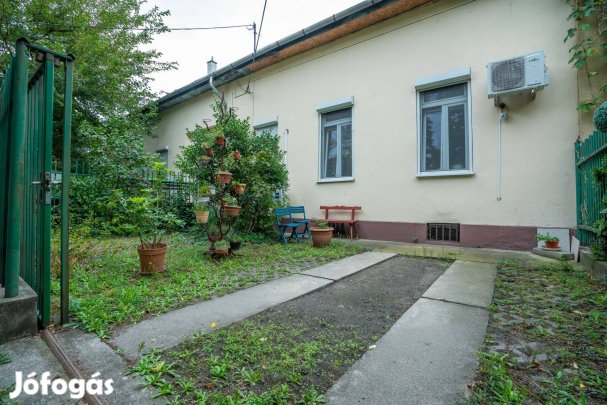 Felújított 2 szobás 49m2 lakás Zuglóban saját beállóval, 36m2 pincével