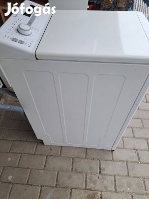 Felültőltös mosógép. 