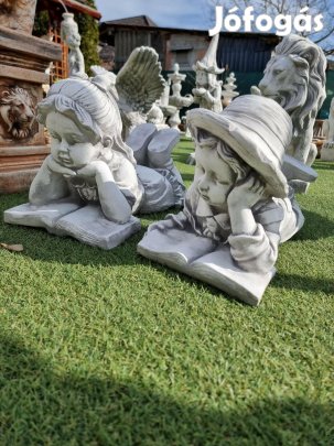 Fiú- lány olvasó műkő szobor