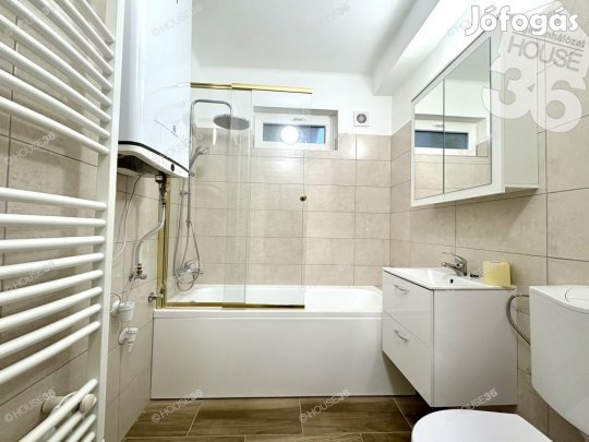 Földszinti 2 szobás, garázsos lakás 217 m2-es kerttel eladó!