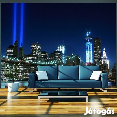 Fotótapéta - Fényszórók a város felett