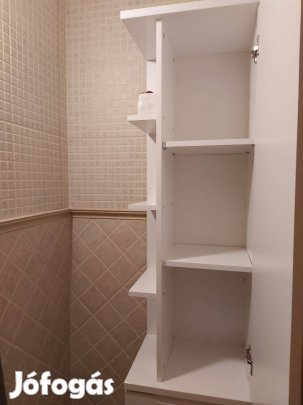 Fürdőszoba szekrény eladó,magasfényű fehér( 190x40x30)