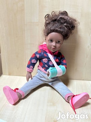 Gipszes karú játékbaba