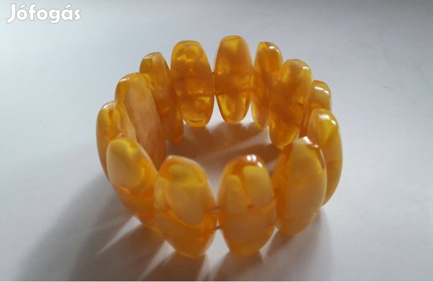 Gumis sárga színű karkötő