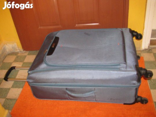 Gurulós bőrönd72x45x30 Airport dezign türkiz vászon gyönyörű 4görgős