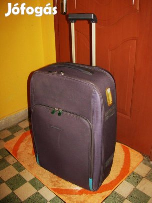 Gurulós bőrönd 67x40x26 szilikon kerekek old névjegytartó újszerű