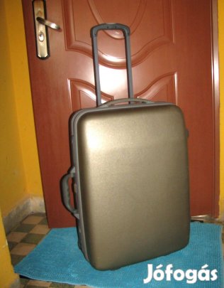 Gurulós bőrönd kemény 64x44x27 Platinium számzár arany kiváló