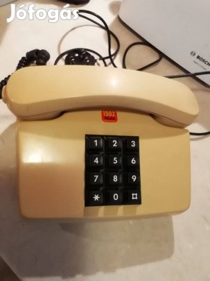 Hibátlan retró vezetékes telefon bész színben
