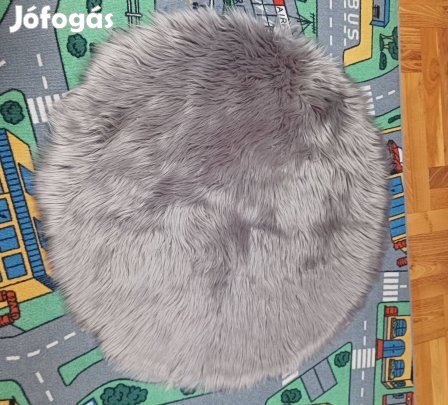 Hosszú szőrű szürke kerek szőnyeg, új. 82 cm átmérőjű