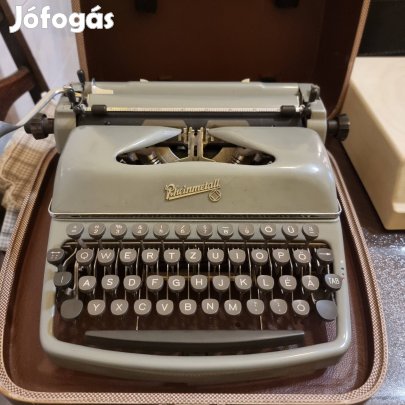 Írógép Rheinmetall saját tokjában