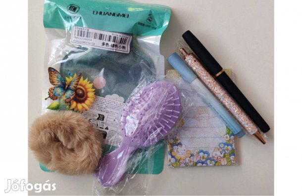 Írószer, meleg vizes palack, mini fésű