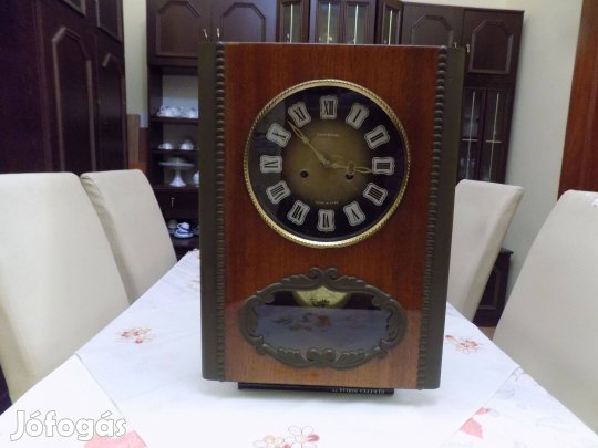 Jantál ingás falióra