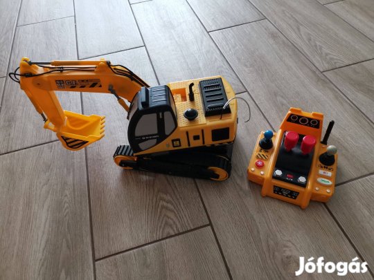 Játék markoló távirányítóval 25 cm x 15 cm + a markoló magassága