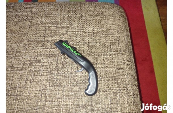 Játék sörnyitó kupak lövő pisztoly