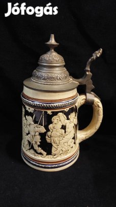 Jelenetes krigli ón tetővel