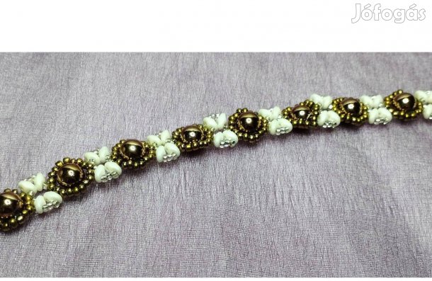 Karkötő arany és fehér színű új