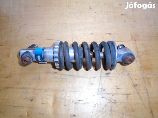 Kerékpár központi rugós tag