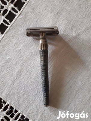 Kézi borotva, nyakánál elfordítható, nyitható