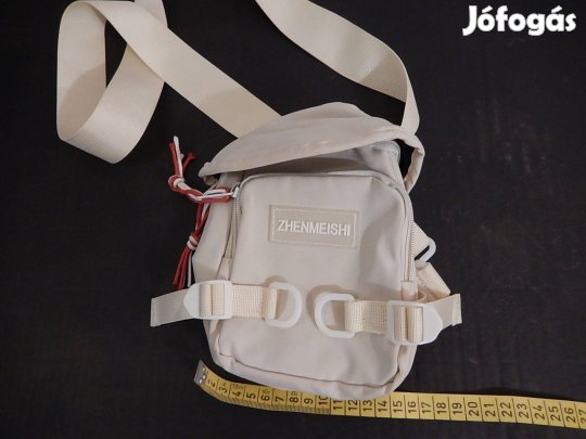 Kis méretű keresztpántos válltáska, utazótáska eladó