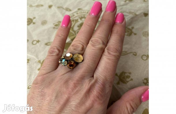 Konplott gyűrű arany-narancs színű kristályokkal