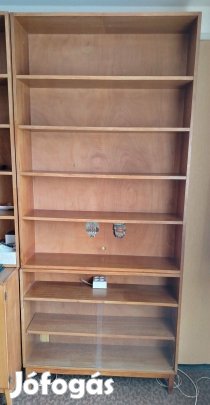 Könyvespolc,alul zárt üveges rész