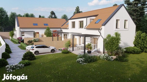 Kőrös Liget - Újépítésű, kertkapcsolatos kétszintes lakás Eladó!