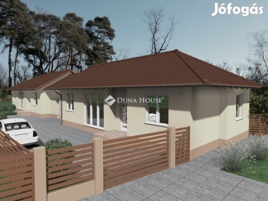 Központban újépítésű ikerházfél, hőszivattyús fűtéssel