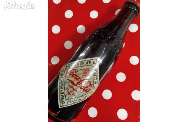 Limitált Jubileumi Coca - Cola szép dombor nyomott üvegben eladó!