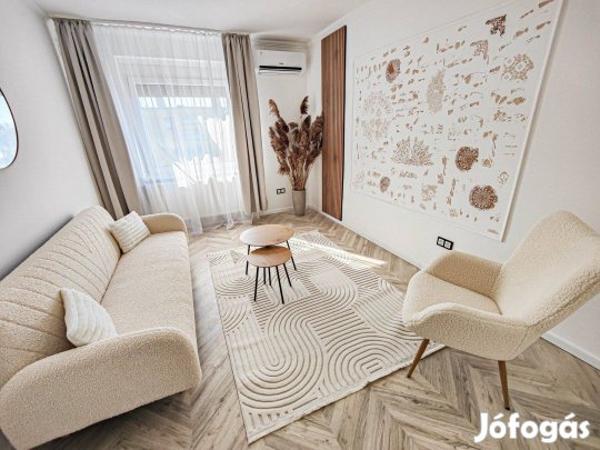 Malomkertben igényesen felújított lakás garázzsal eladó