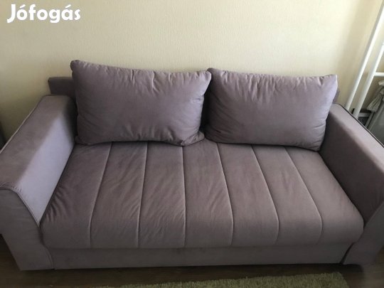 Mályva színű ágyneműtartós kanapé eladó