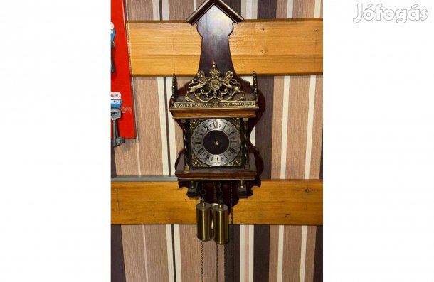 Mechanikus, felső csengős, súlyhuzamú, ingás, felesütős falióra