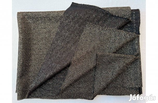 Méteráru, textil (dzsörzé) arany csillogós, fekete