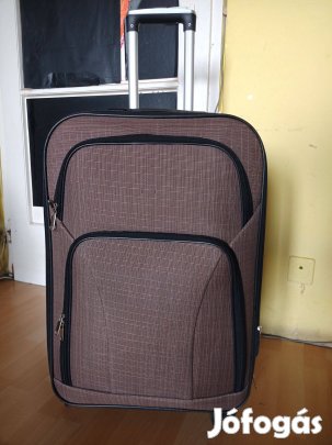Minőségi nagy , utazó , gurulós bőrönd 70X43X30