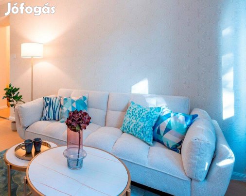 Modern, stílusos, vadonatúj krém színű kanapéágy eladó