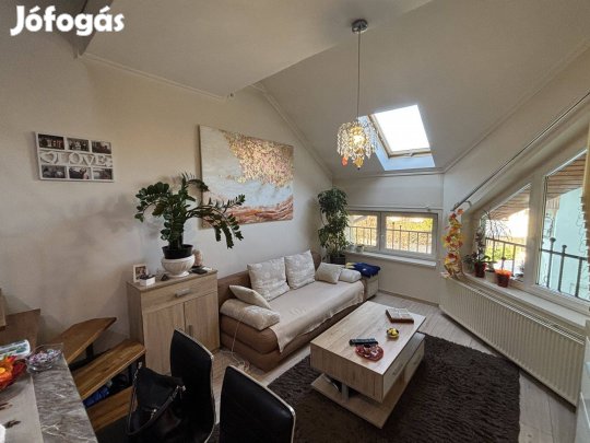 Modern otthon, egyedi elrendezés a város szívében!